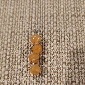 Elegant Orange Beaded Pendant